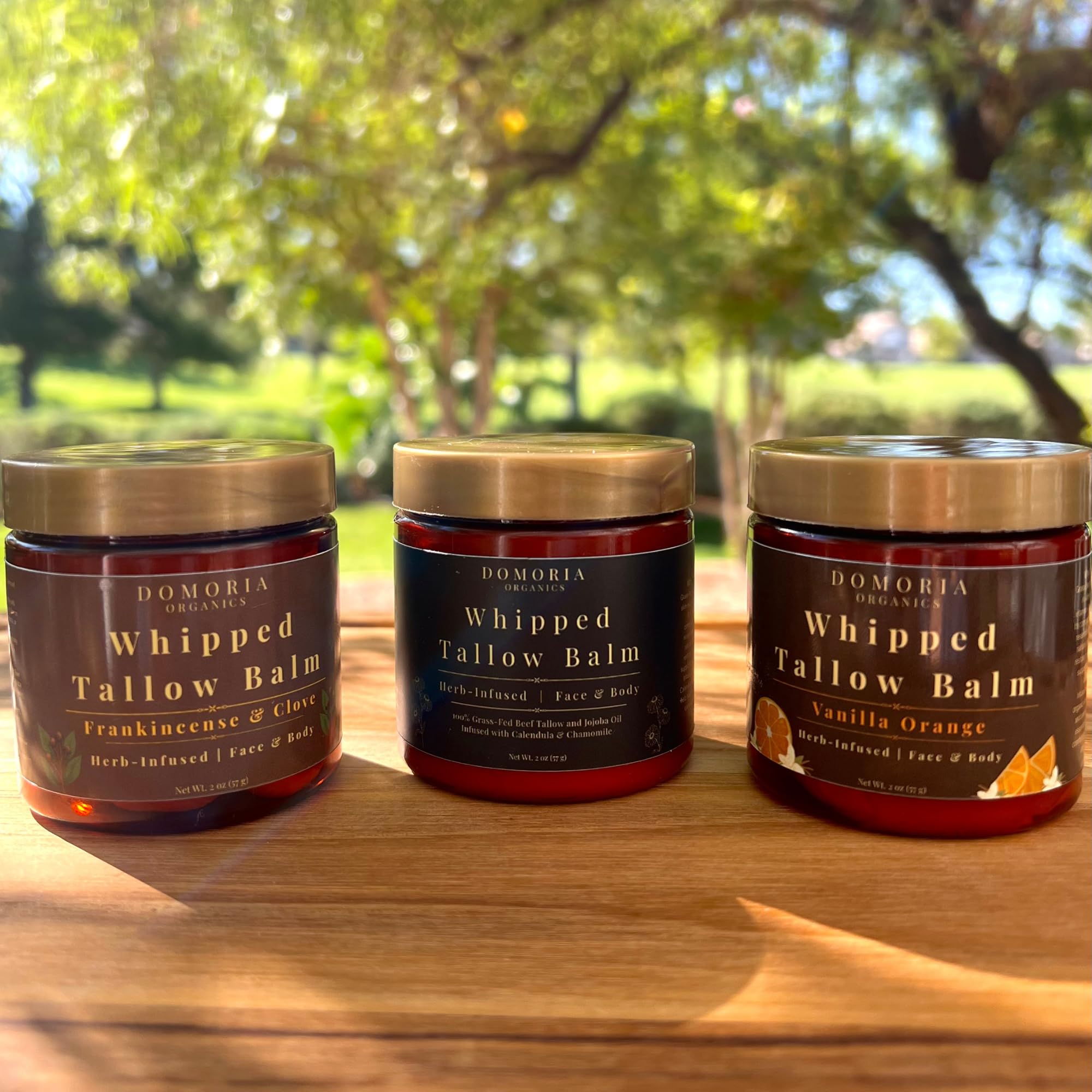 Domoria Organics frankincense clove balm jar with grounding aroma and moisture.