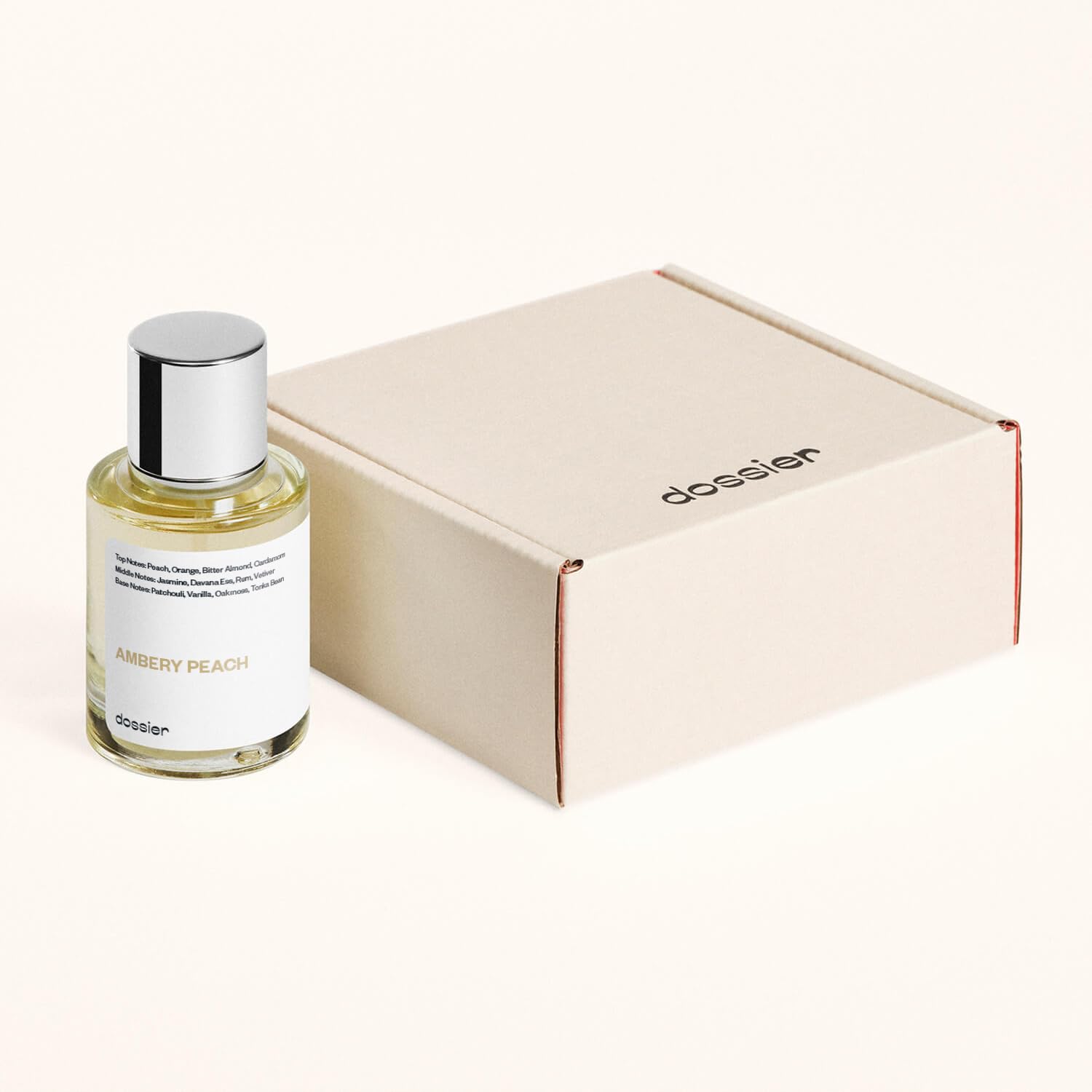 Dossier Ambery Peach hand application, compact bottle for on-the-go fragrance touch-ups.