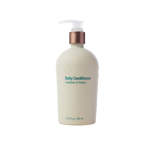 doTERRA Daily Conditioner pour-spout demonstrates easy, mess-free application for smooth, frizz-free hair.