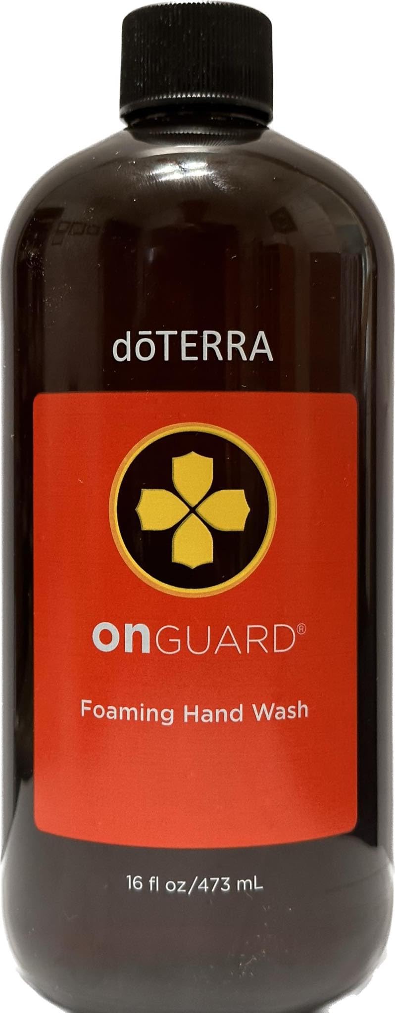 doTERRA On Guard foaming hand wash bottle demonstrates gentle cleansing and refreshing spice-citrus aroma.