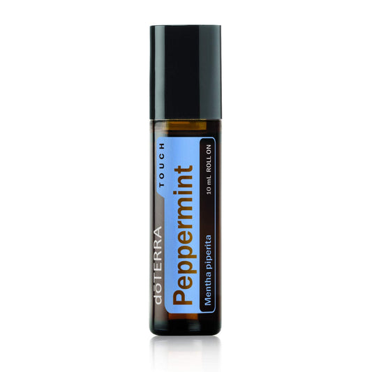 doTERRA Peppermint Touch bottle closeup showing compact roll-on for on-the-go cooling relief.