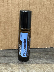 doTERRA Peppermint Touch roll-on application demonstrates quick, soothing aroma for focus and travel.