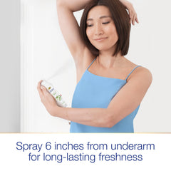 Close-up of the spray nozzle releasing a fine mist for freshness