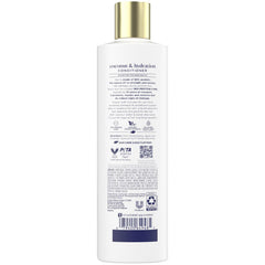 Close-up of Dove Damage Therapy Conditioner bottle emphasizing lightweight coconut formula for smoother hair.