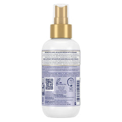 Dove Hair Therapy Brilliant Gloss serum pump in use for even end to end coverage