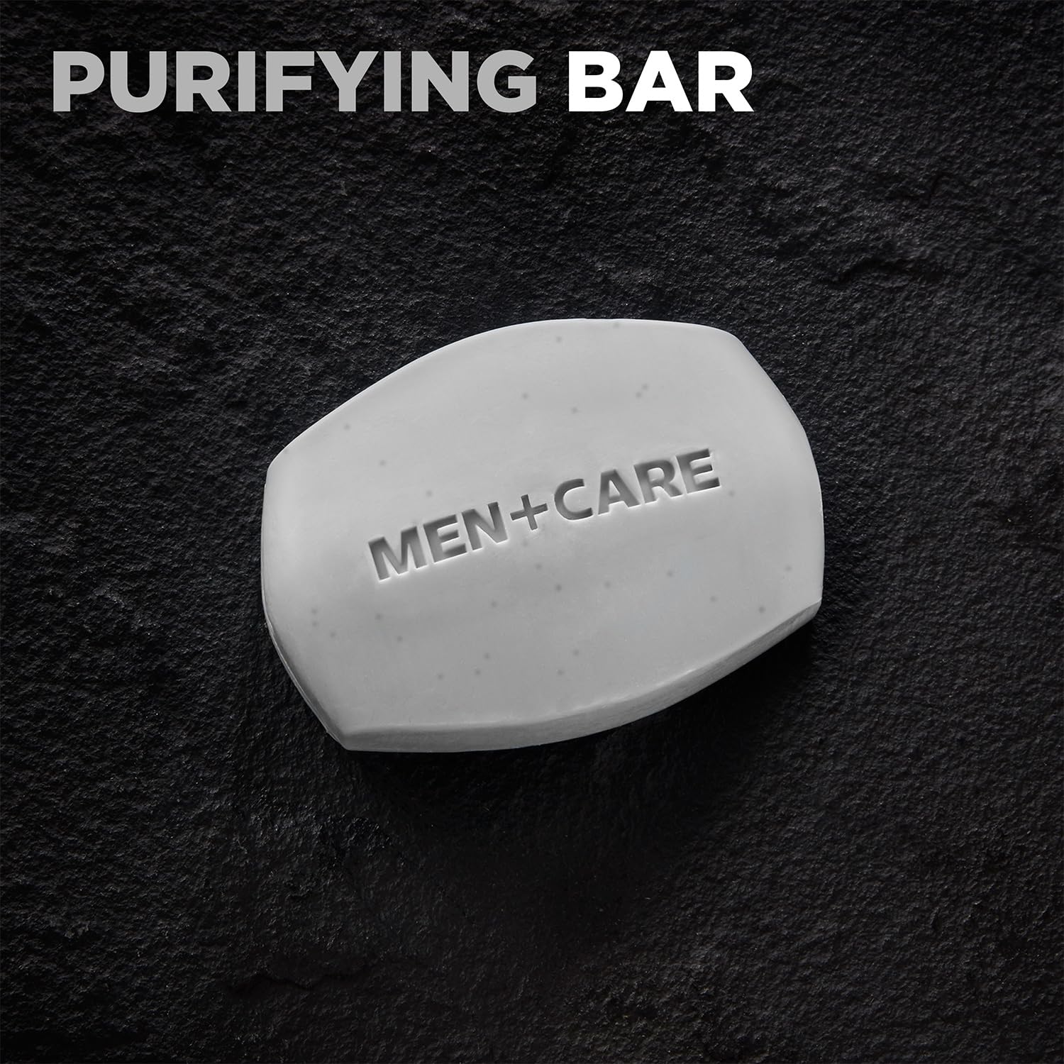 Dove Men+Care charcoal bar lather close-up with a smooth cleansing feel.