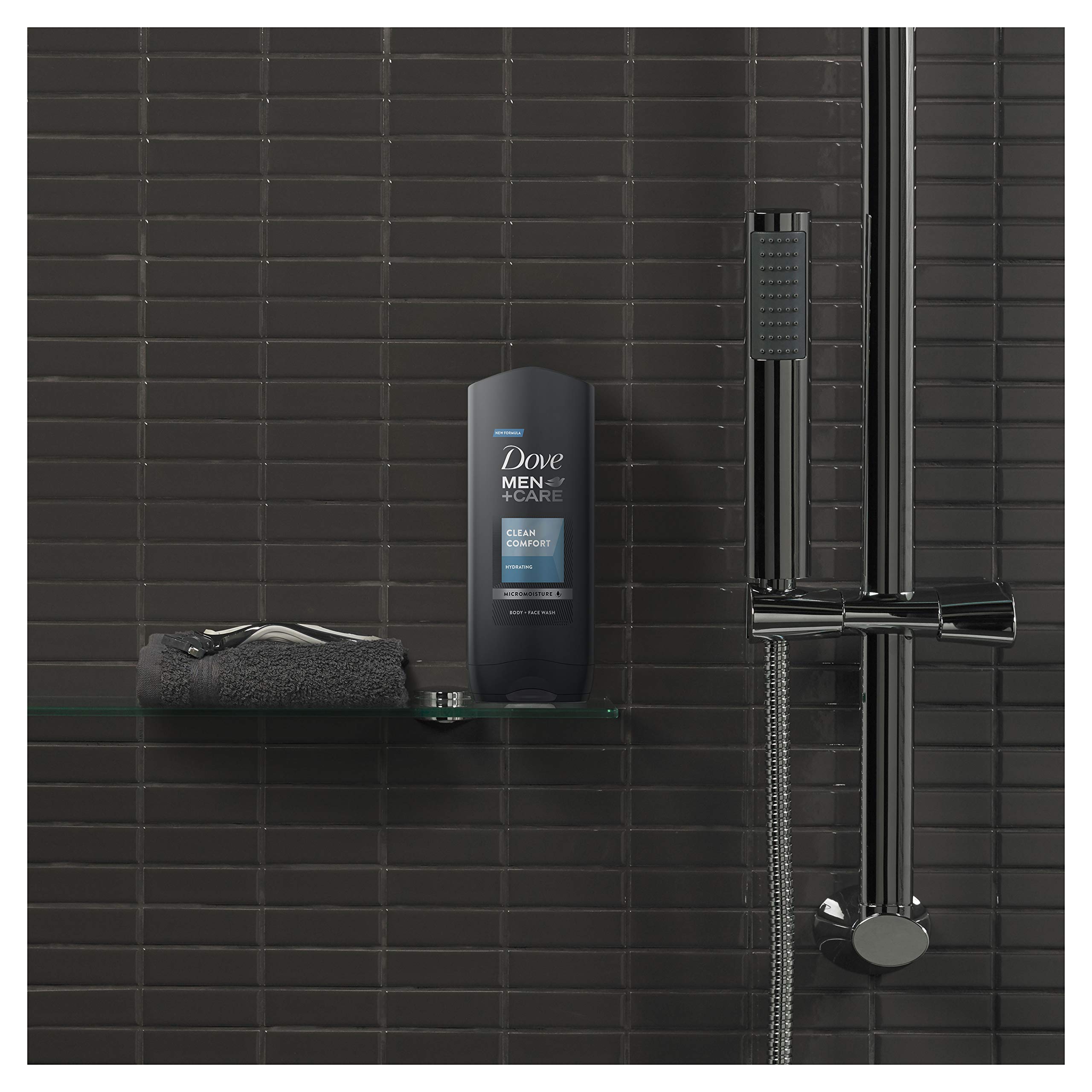 Hands holding Dove Men Clean Comfort bottle, easy everyday cleansing