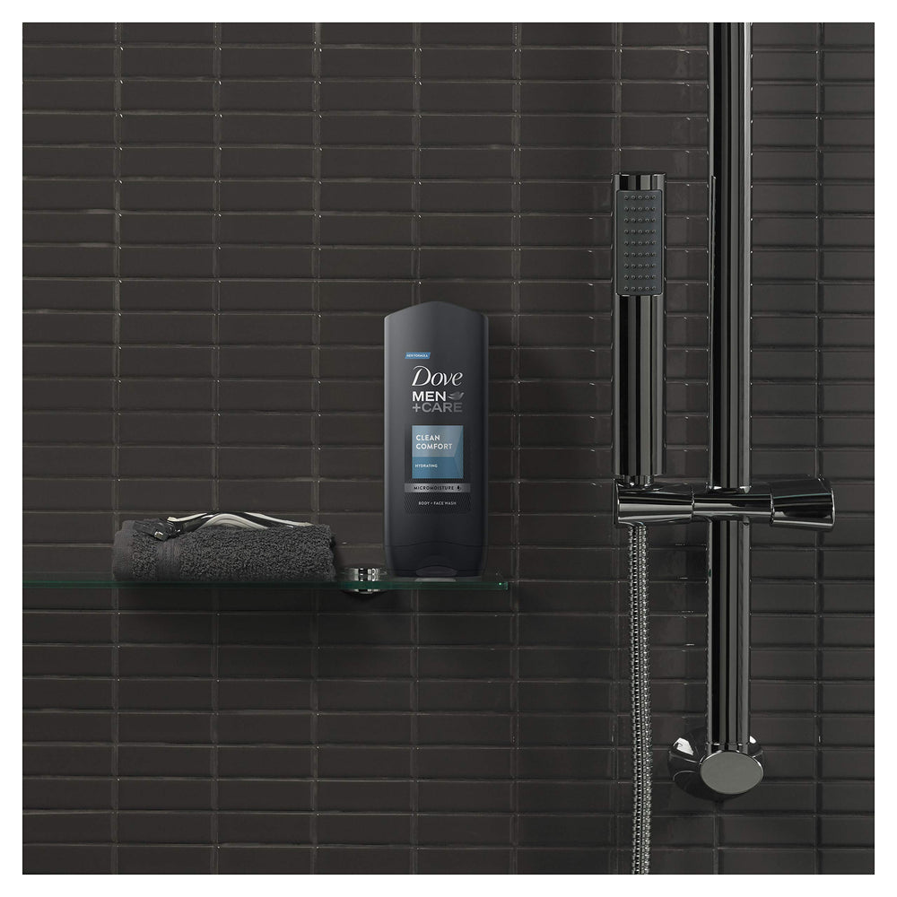 Hands holding Dove Men Clean Comfort bottle, easy everyday cleansing