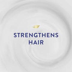 Dove Hair Mask being applied to mid-lengths for nourishment.