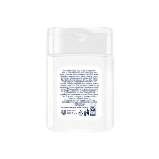Dove mini 1oz shampoo bottle showcased as a hotel amenity for guest comfort.