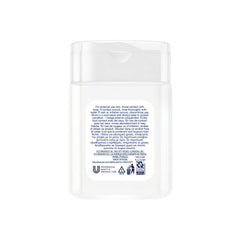Dove mini 1oz shampoo bottle showcased as a hotel amenity for guest comfort.