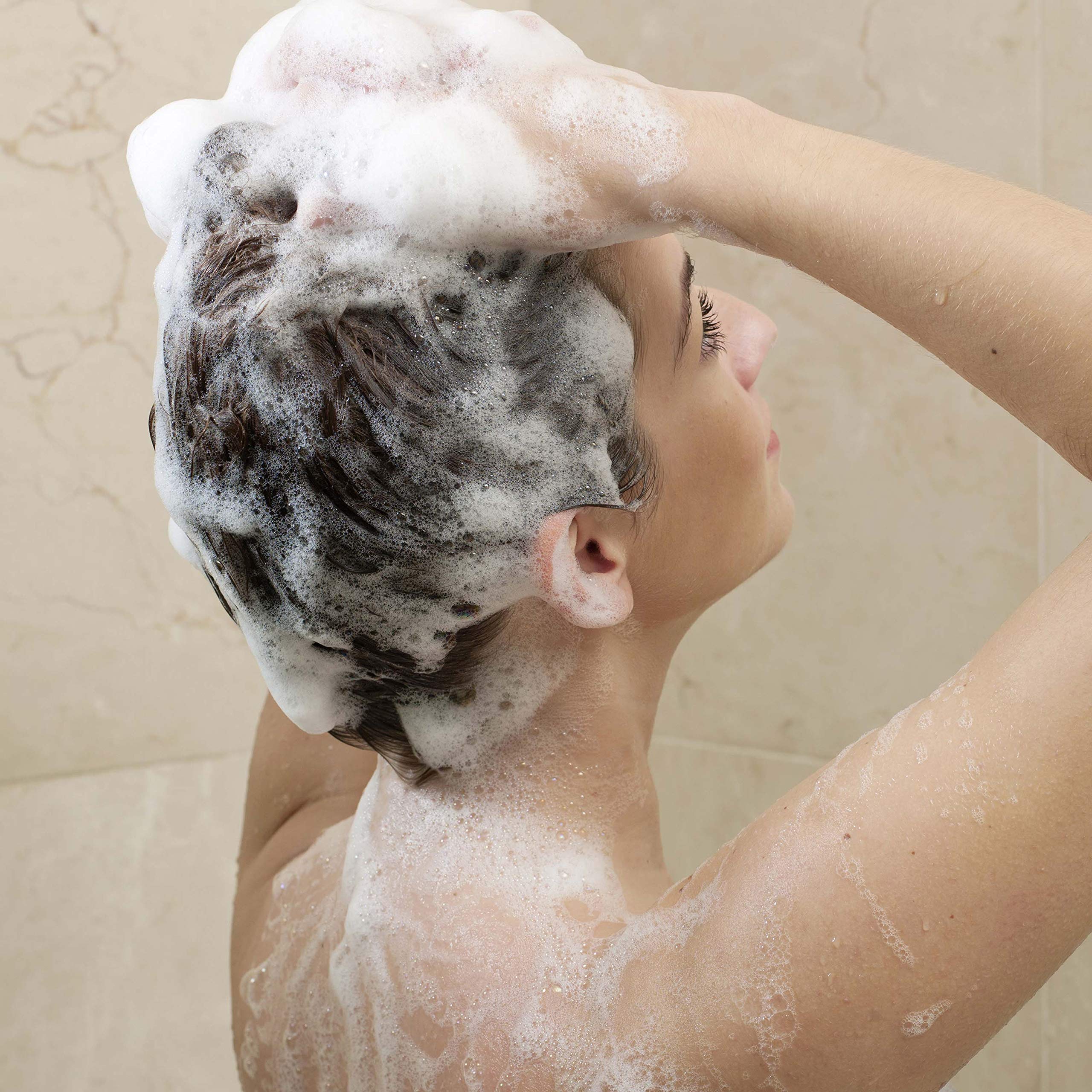 Dove Daily Moisture Shampoo used as part of a daily hair care routine.
