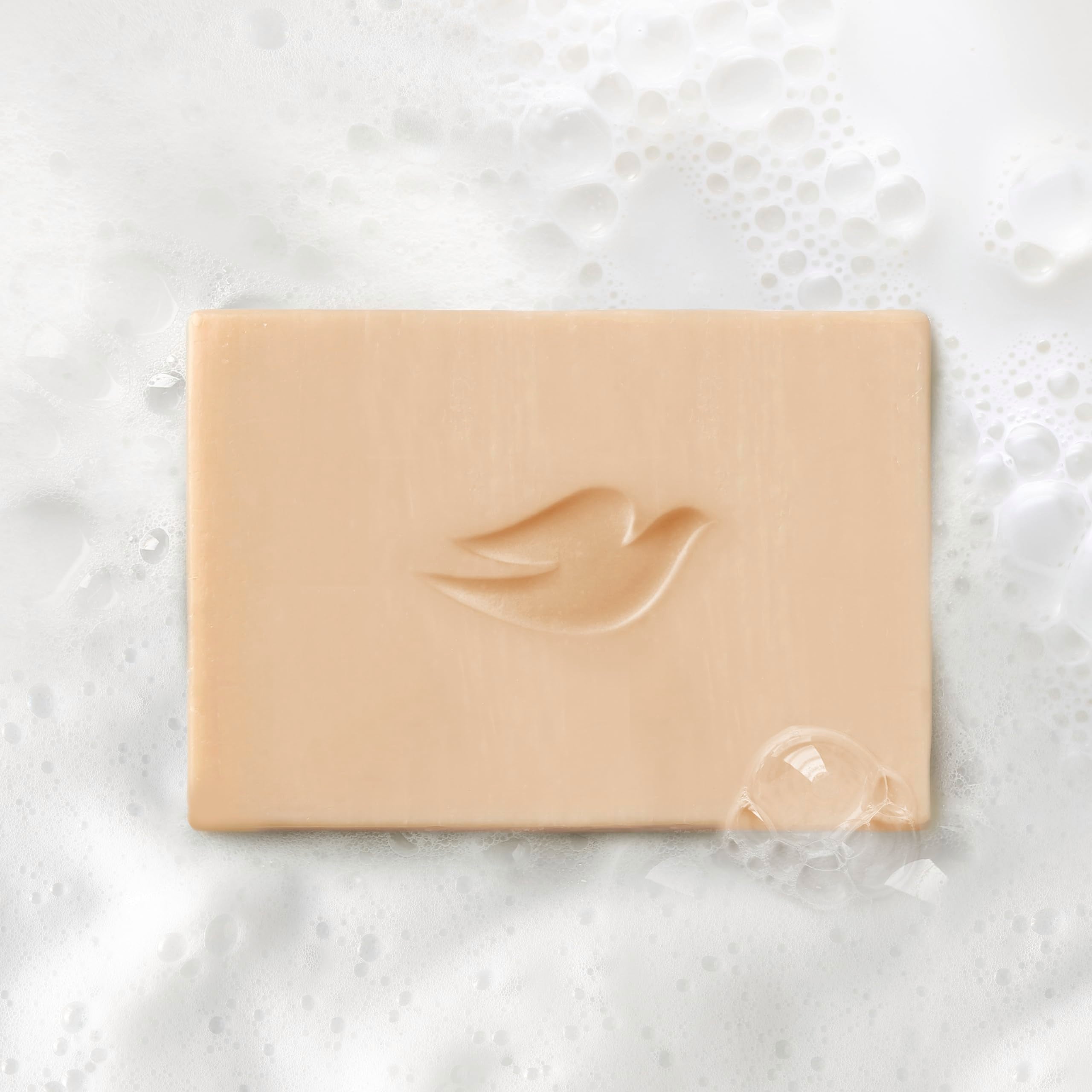 Dove Plant Milk Cleansing Bar demonstrates sulfate-free formula for sensitive skin.
