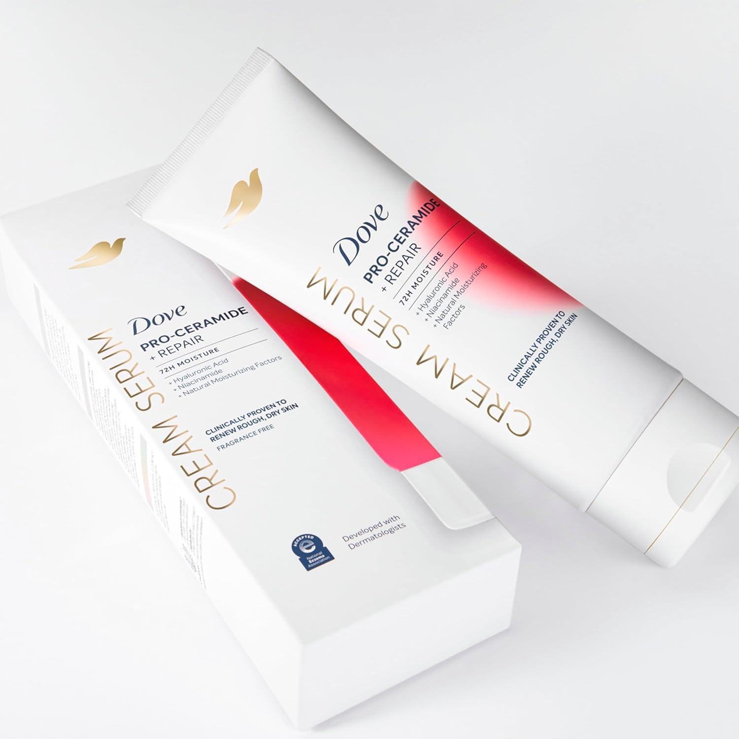Dove Pro-Ceramide Repair Serum with velvety finish on skin.