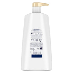 Pouring Dove Ultra Care Coconut & Hydration shampoo for instant hydration.