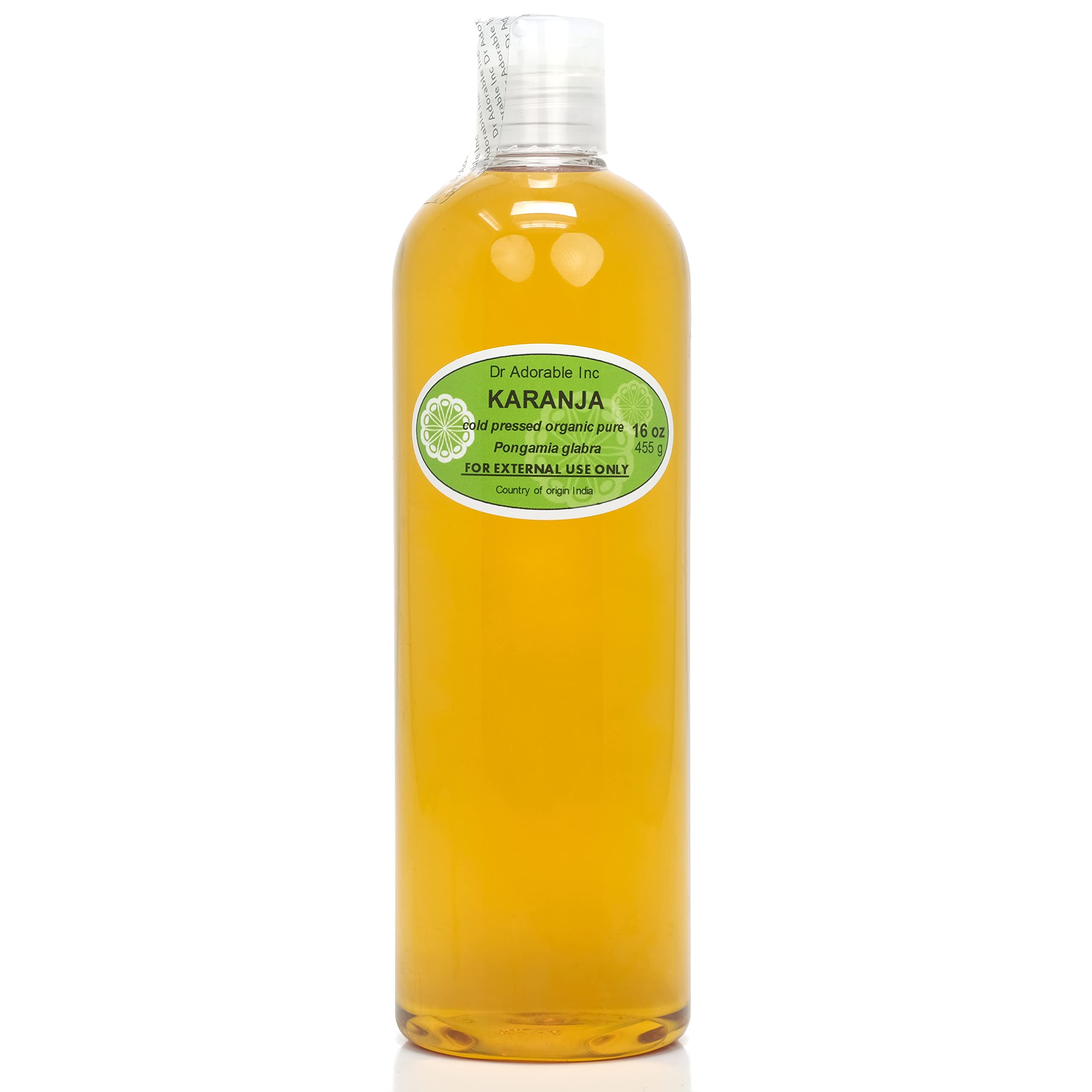 Dr Adorable Karanja Oil bottle close-up for skin care and massage