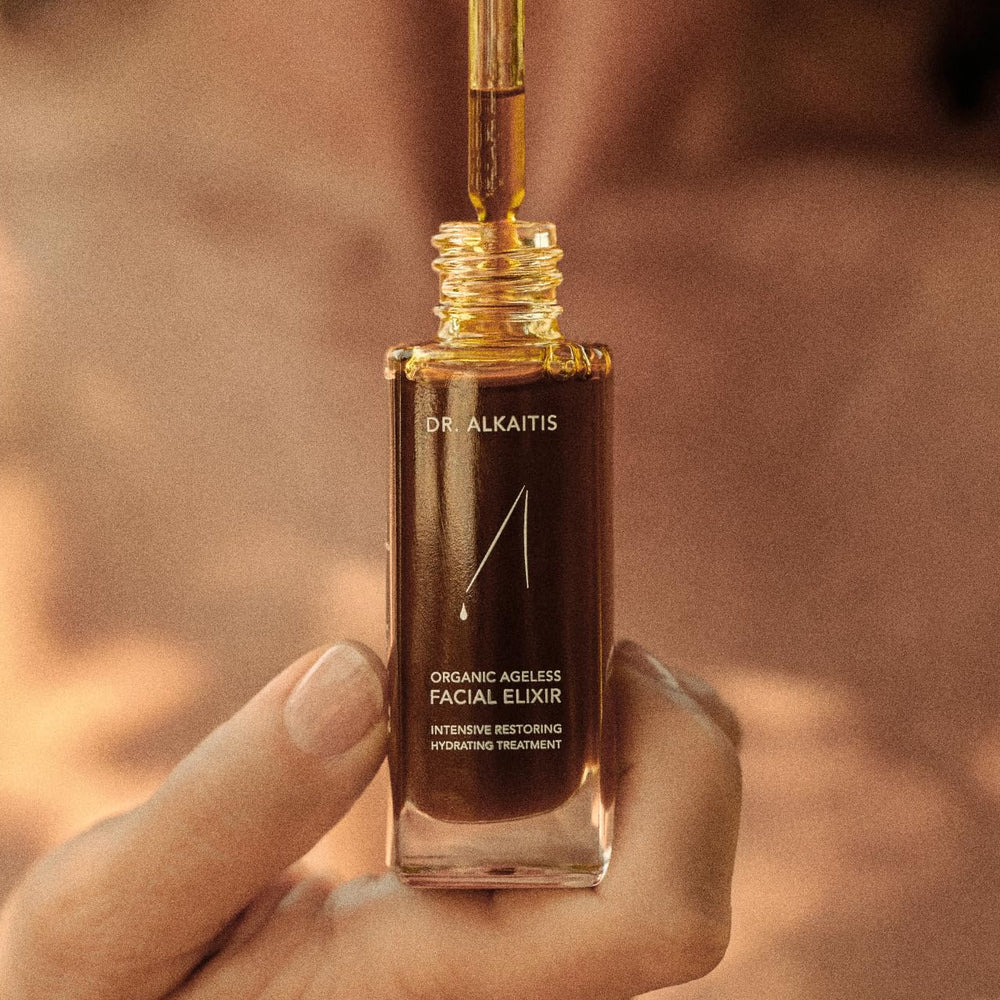 Dr. Alkaitis Ageless Elixir ingredients jar showcasing rare oils and botanicals for nourishing skin.