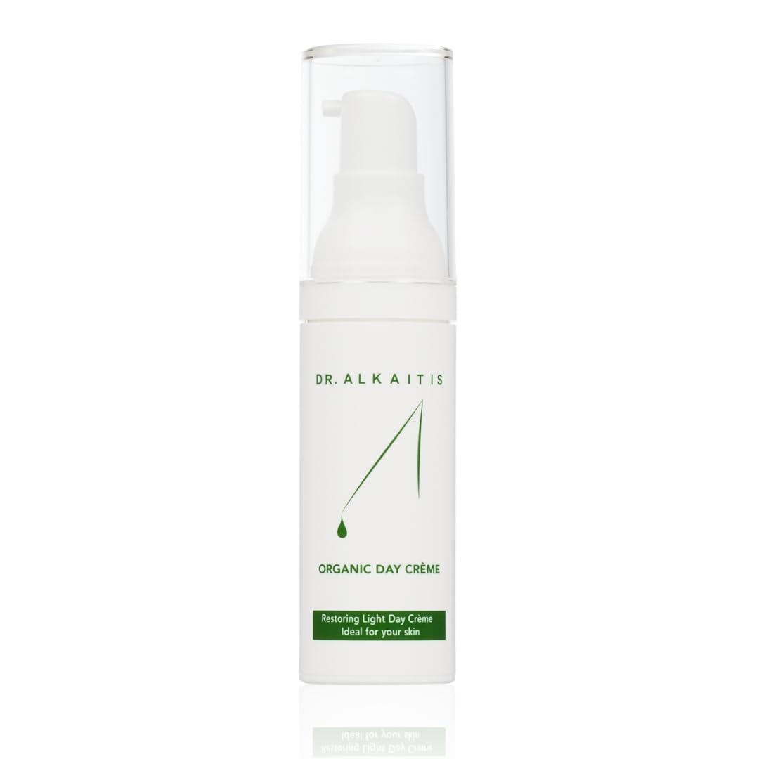DR. ALKAITIS Organics Day Crème bottle with creamy texture and daily protection.