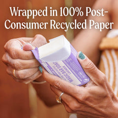Dr. Bronner's packaging shown as post-consumer recycled wrapper for sustainability.