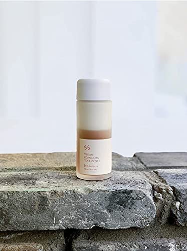 Ingredients close-up on Dr. Ceuracle Kombucha Tea Essence featuring Camellia Sinensis and Saccharomyte Filtrate