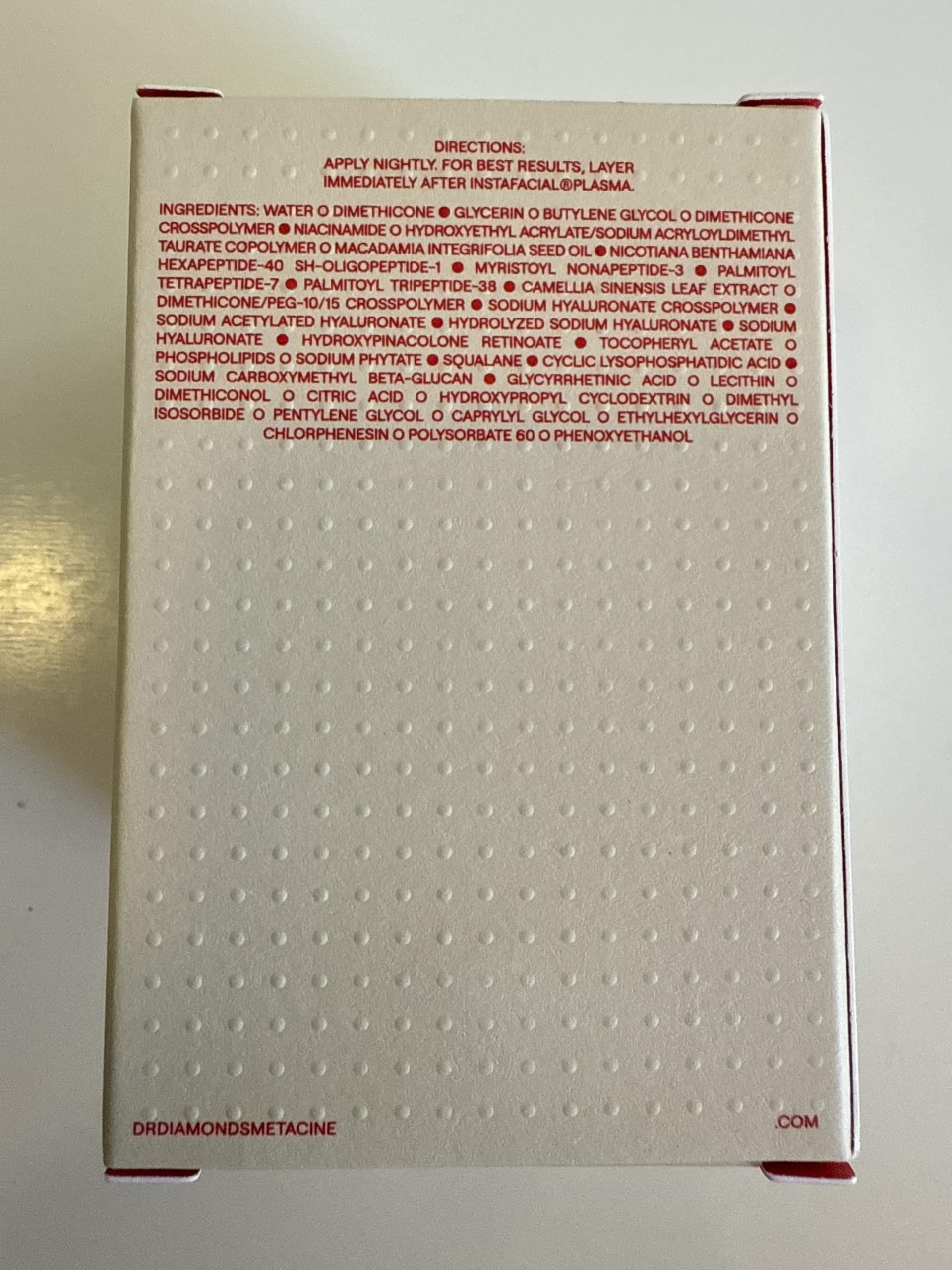 Gift-ready packaging image featuring the branded bottle and box.