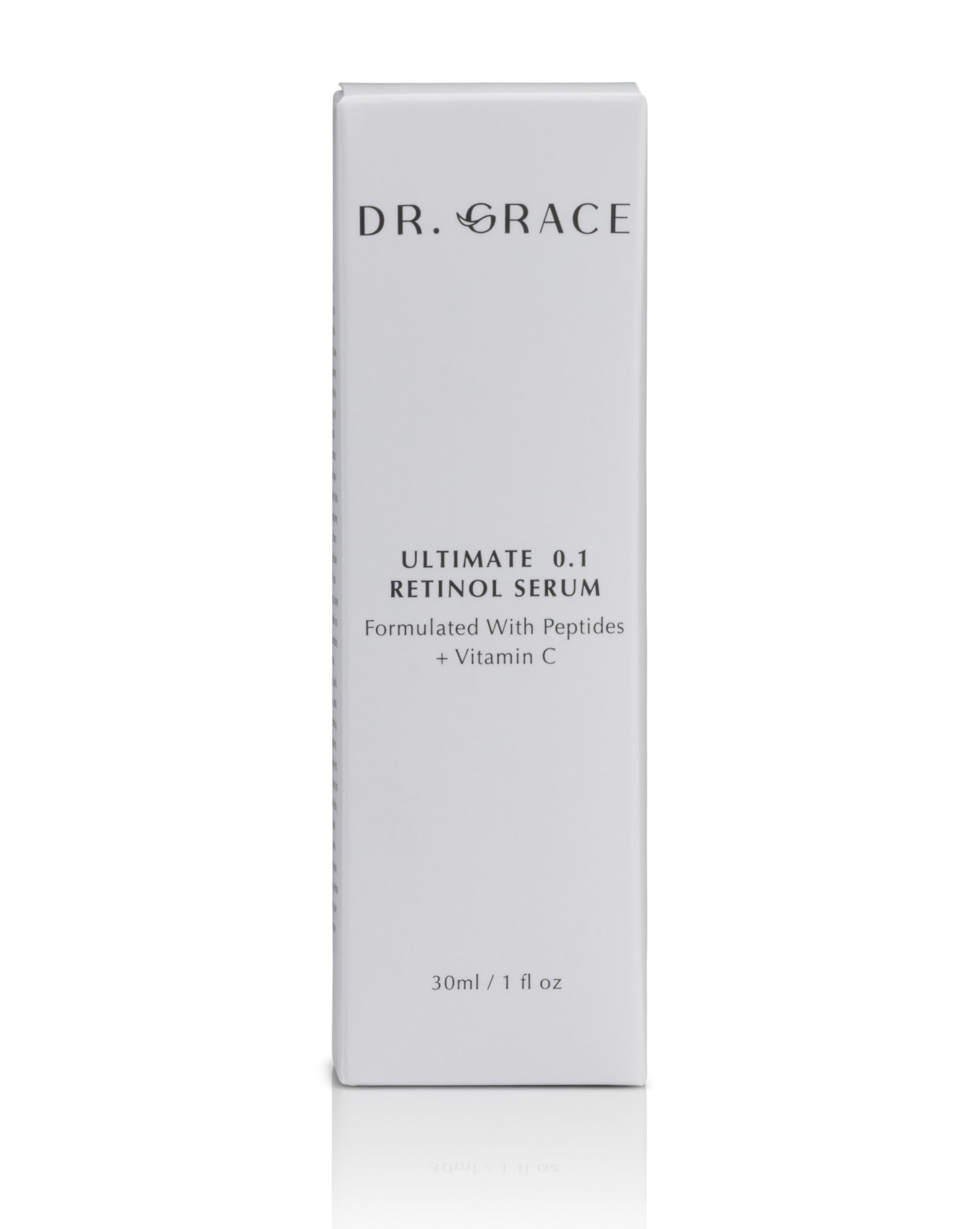Dr. Grace Ultimate Retinol Serum on hand for even application.