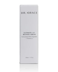 Dr. Grace Ultimate Retinol Serum on hand for even application.
