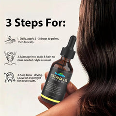Dr. Healdy Batana Oil on hair strands to combat dryness and soften ends.