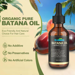 Dr. Healdy Batana Oil being applied by hand for easy daily nourishment.