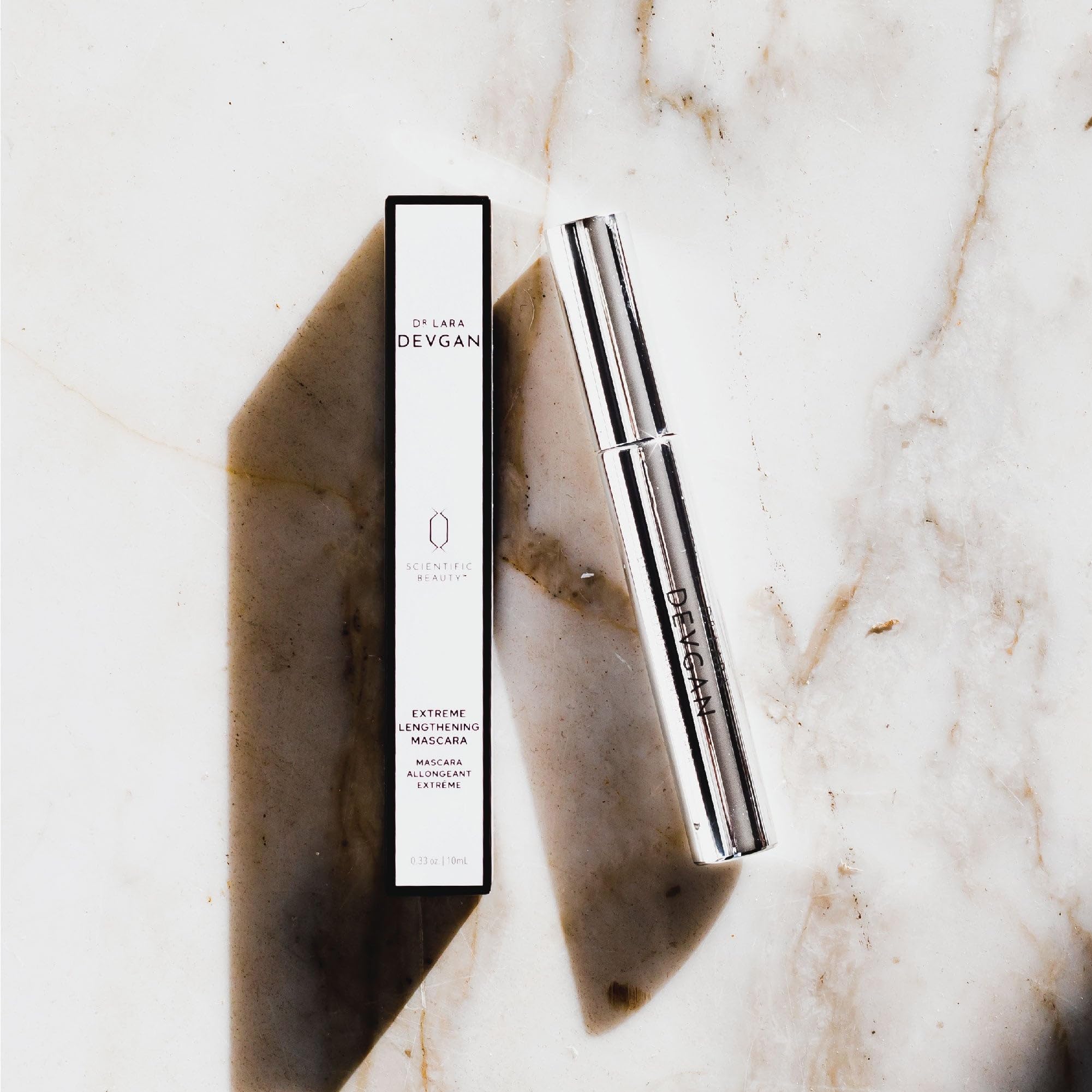 Close-up of the mascara brush delivering precise curl and definition.