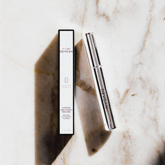 Close-up of the mascara brush delivering precise curl and definition.