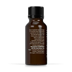 Dr. Organic Tea Tree Nail Solution application-on-nail demonstrates easy, precise use.