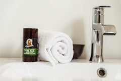 Dr Squatch Pine Tar deodorant 2-pack on nightstand for daily freshness