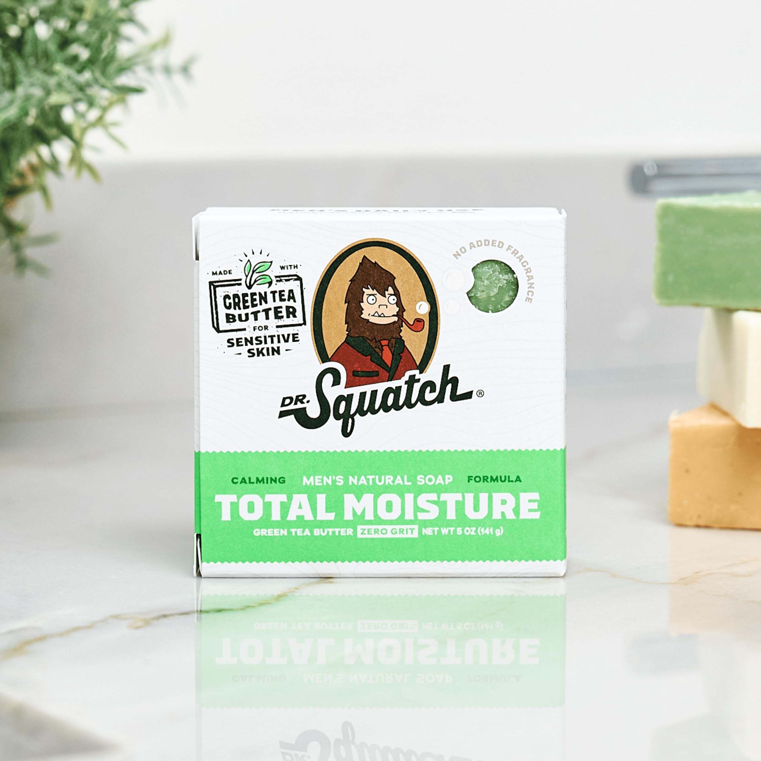 Dr. Squatch Total Moisture bar soap in hand suggests a simple, refreshing daily cleanse.