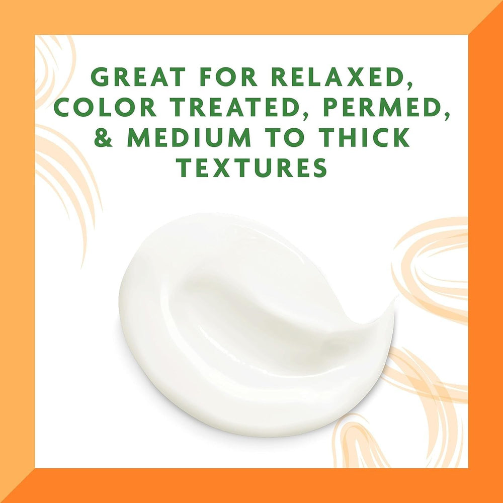 Dr Teal's Cantu smoothing leave-in applied to damp hair for detangling ease