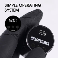Dragonhawk Atom wireless tattoo pen kit side view shows ergonomic grip for steady control.