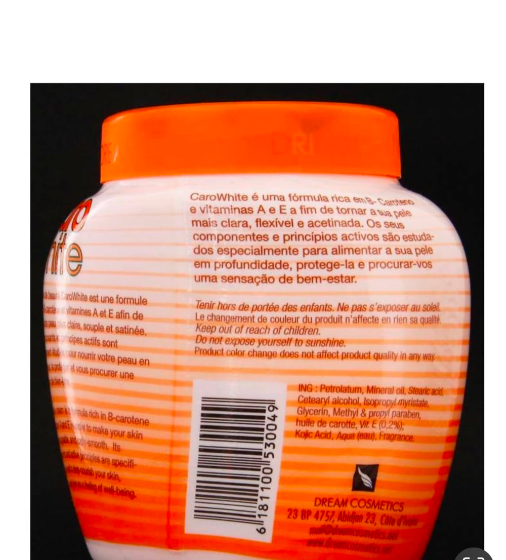 Dream Cosmetics cream jar close-up showing rich texture for nourishing skin.