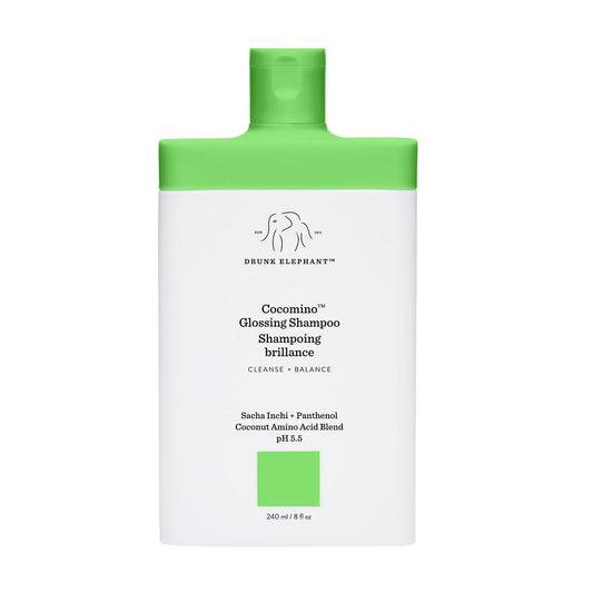 Drunk Elephant Cocomino shampoo bottle shows gentle cleanse for color-treated hair.