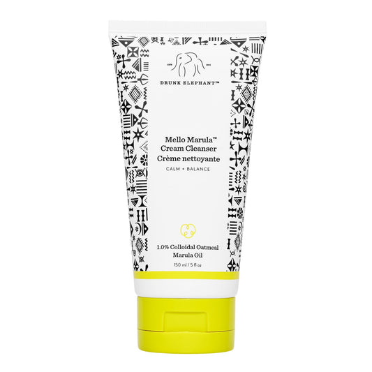 Drunk Elephant Mello Marula Cream Cleanser bottle close-up for gentle makeup removal.