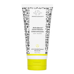 Drunk Elephant Mello Marula Cream Cleanser bottle close-up for gentle makeup removal.