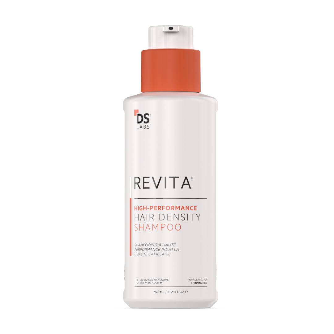 DS Laboratories Revita shampoo bottle pour shows rich lather for daily scalp cleansing.