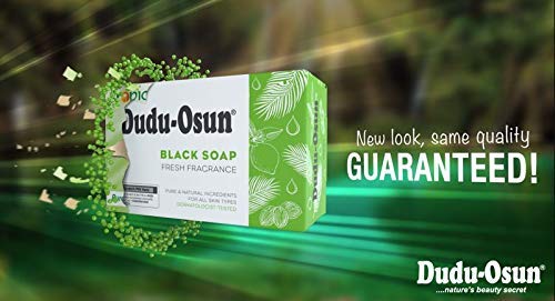 DuDu Dudu Osun soap in use on skin for smooth, nourished feel.