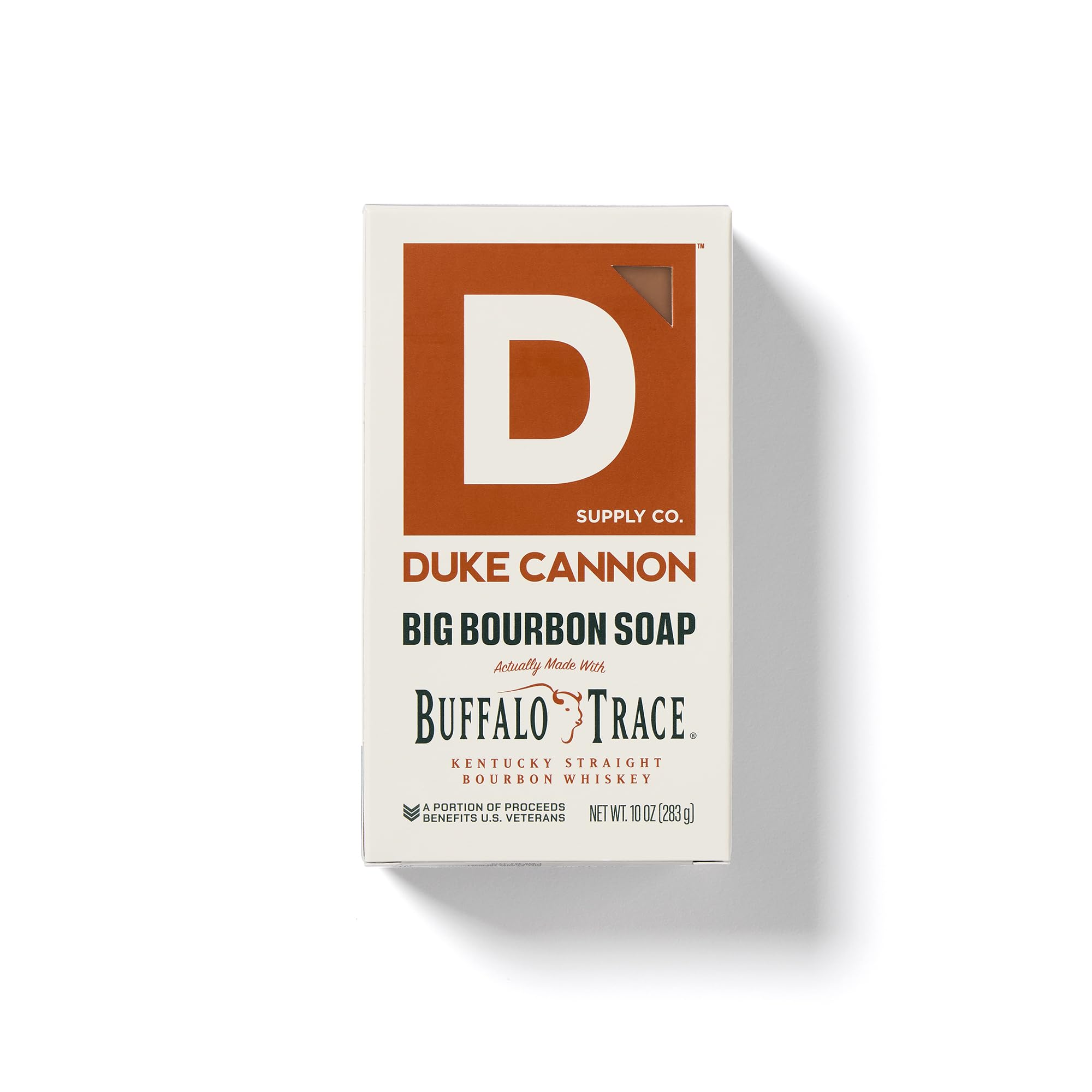 Duke Cannon Bourbon soap bar close-up emphasizing warm, earthy fragrance and smooth skin care