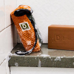 Duke Cannon Fresh Cut Pine scent enhances shower ambiance at home gym.