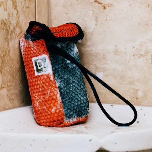 Duke Cannon Tactical Scrubber coarse-mesh for heavy scrubbing and grime removal