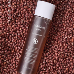 DumiDang Toner application on hand demonstrates quick-absorbing formula for refreshed skin.