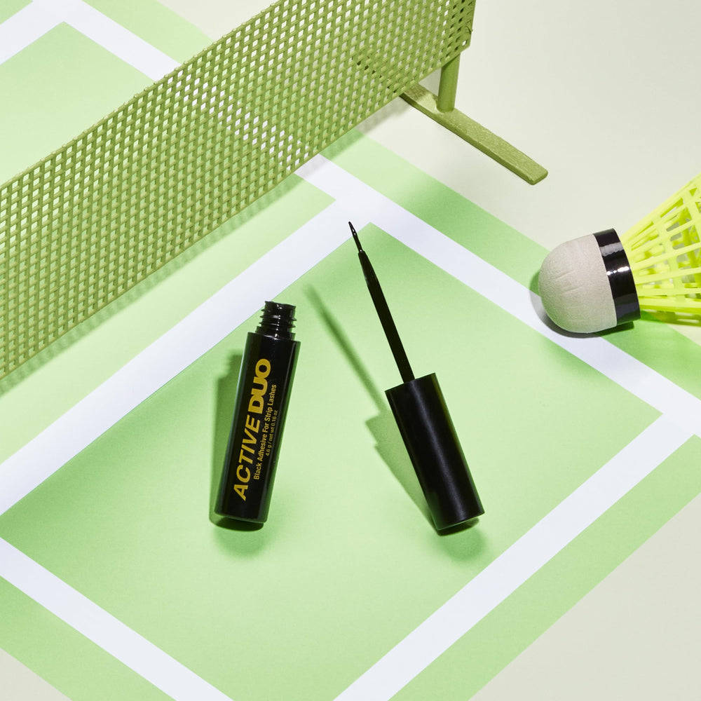 Travel-friendly, leak-proof DUO Active Black Eyelash Glue tubes in a compact kit.