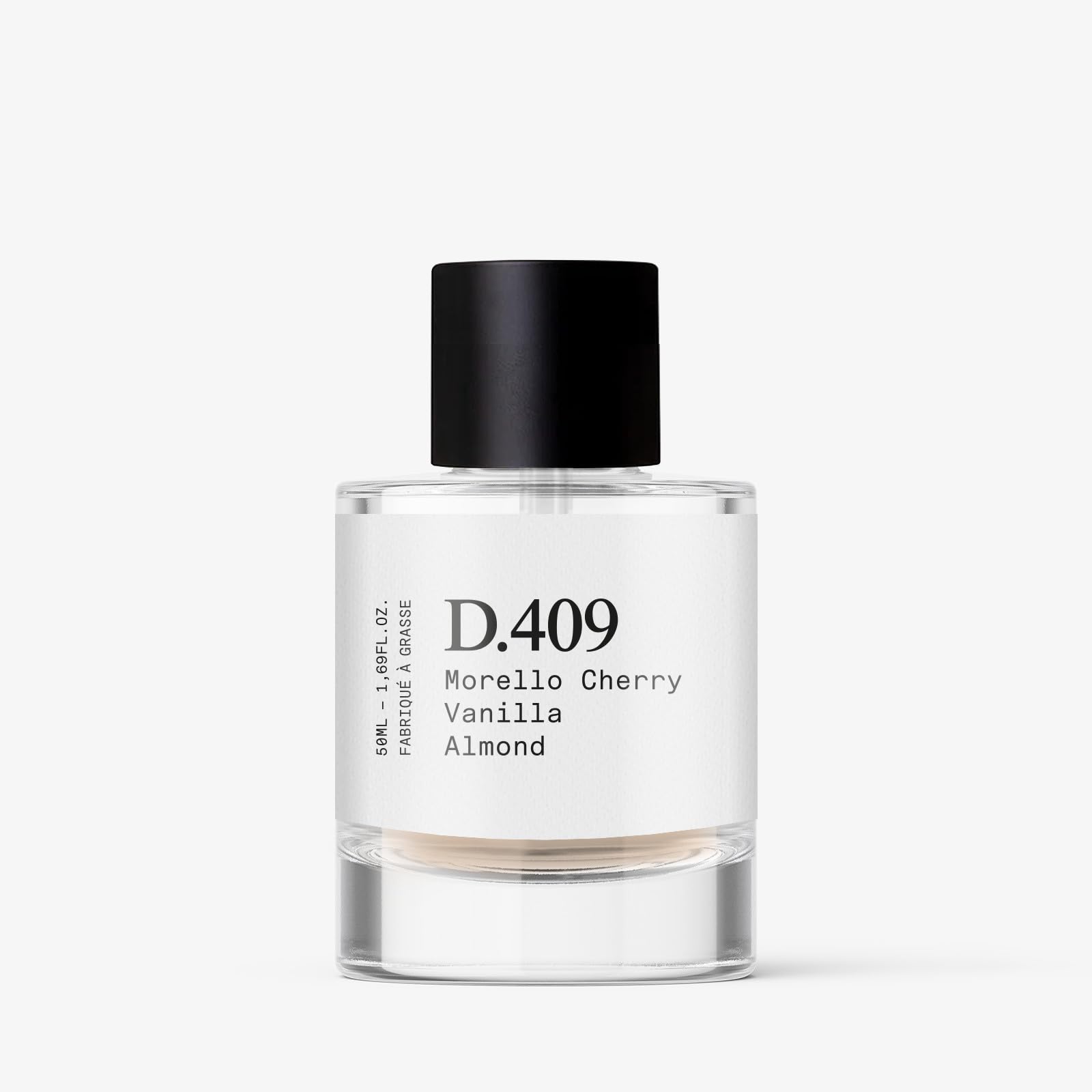 Dupe. Paris D.409 packaging emphasizes vegan, clean ingredients for responsible luxury.