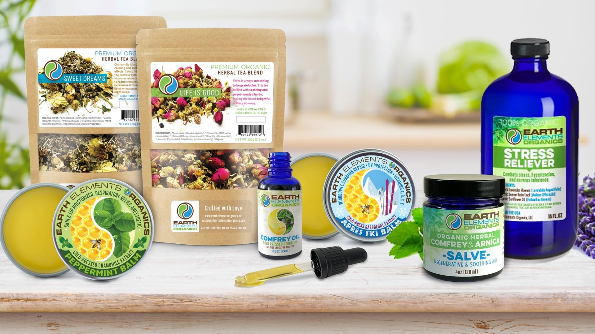 Earth Elements Organics Peppermint Chamomile Balm packaging label emphasizes organic ingredients.