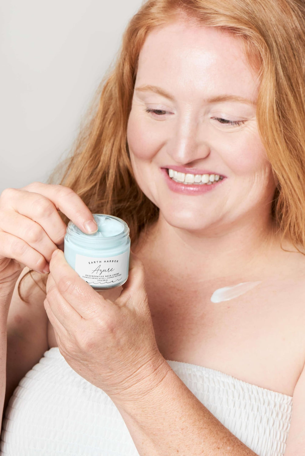 Earth Harbor Azure Neck Creme application shot for daily neck care.